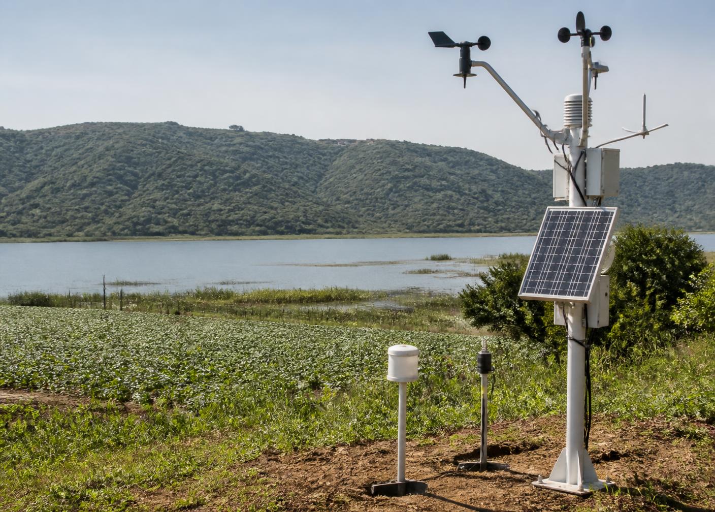 Environmental weather, air quality and soil monitoring station beside an Indian lake